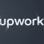 Dark textured background featuring distressed white "upwork" text with scattered paint splatter effects.